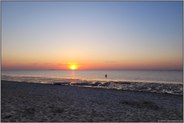 der Fotograf... Cuxhaven *Nordsee*, Sonnenuntergang über dem Wattenmeer vor Duhnen, Blick auf Neuwerk